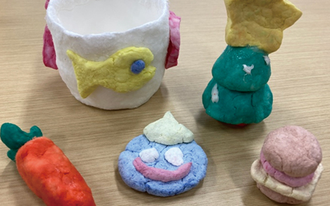 Works of fifth-grade students using paper clay made from recycled pulp